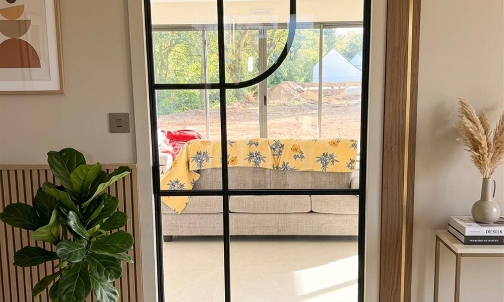 porte à galandage style verrière  avec design arrondi ARINOX  - 